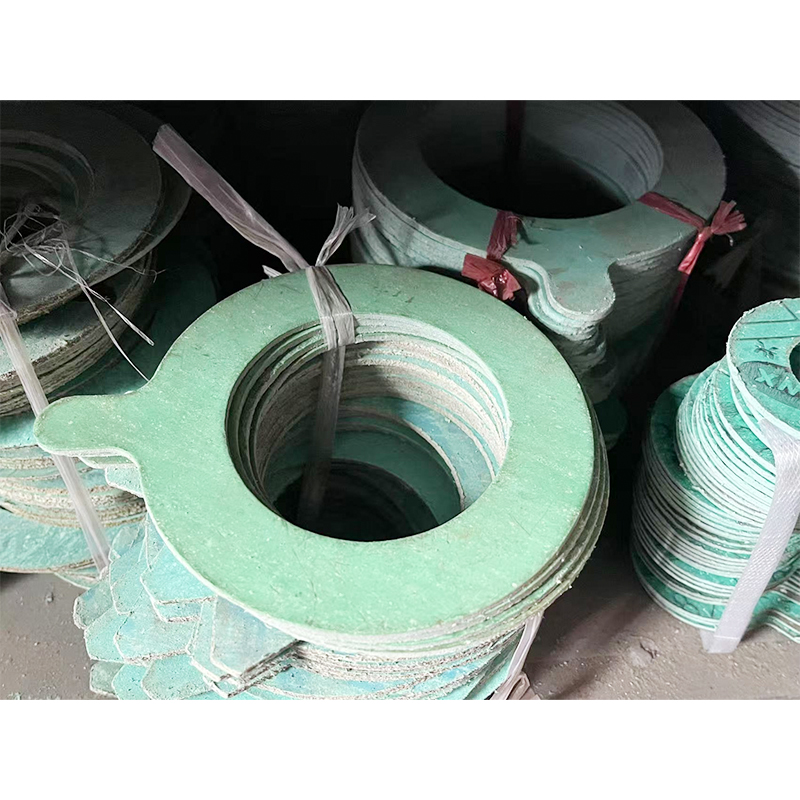 Why is PTFE gasket virtually impervious to strong acids, bases, and organic solvents?